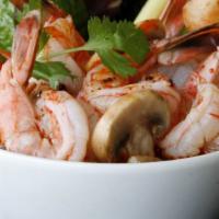 Tom Yum Goong · Spicy and sour soup with fresh shrimp, lemon grass, tomatoes, mushrooms and lime juice.