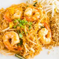 Shrimp Pad Thai · Rice noodles sauteed with shrimp, ground peanuts, bean sprouts, and fresh scallions.