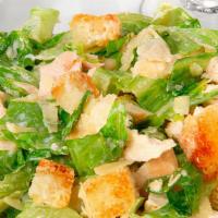 Chicken Caesar Salad · Crisp romaine lettuce, croutons, parmesan cheese, grilled chicken, and creamy Caesar dressing.