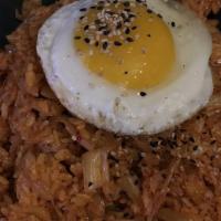 Kimchi Fried Rice · Fried rice with kimchi and fried egg on top.