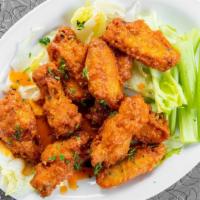 Chicken Wings (10) · Breaded chicken wings deep fried golden brown tossed in desired sauce. Hot or Mild sauce