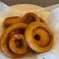 Onion Rings · Ring of onion dipped in batter and then deep fried.