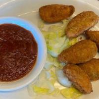 Jalapeño Poppers · Cream cheese stuffed Jalapeno pepper battered and fried.