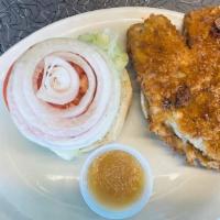 Fish Sandwich · Fried tilapia with lettuce and tartar sauce.
