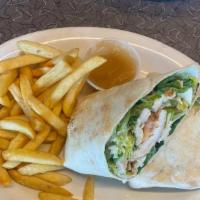 Chicken Caesar Wrap · Grilled Chicken Breast with drizzled Caesar dressing Wrapped in a warm tortilla with lettuce...