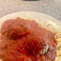 Spaghetti & Meatballs · spaghetti pasta , tomato sauce and homemade  meatballs topped with grated cheese