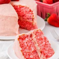 Vegan Strawberry & Cream Cake · 100% Plant-based Strawberry cake layer with fresh strawberry icing.