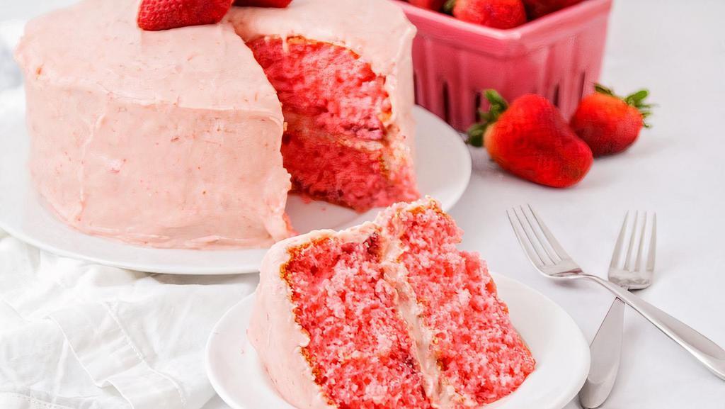Vegan Strawberry & Cream Cake · 100% Plant-based Strawberry cake layer with fresh strawberry icing.