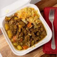 Curry Goat Platter · Half Curry Goat Half meat of choice