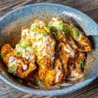 Diablo Wings · Fried chicken wings served in our diablo sauce, refreshing yogurt sauce, topped with scallio...