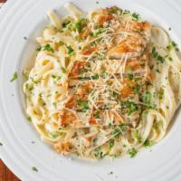 Fettuccine Alfredo · Imported flat pasta with our creamy alfredo sauce.