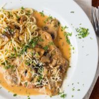 Veal Marsala · Pan-seared scallopini veal, mushrooms, marsala wine and a touch of cream with a side of spag...