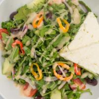 Feta Salad · House greens, sweet peppers, onion, tomatoes, olives and white balsamic vinaigrette.