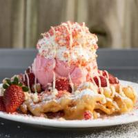Strawberry Shortcake Funnel Cake · Served with sliced strawberries, strawberry ice cream, whipped cream, shortcake crumbs, pudd...