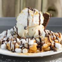 S’More Lovin · Served with vanilla ice cream, whipped cream, marshmallows, chocolate chips, graham crumbs, ...
