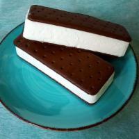 Big Vanilla Ice Cream Sandwich 24 Ct. · Premium vanilla ice cream between two crisp chocolate wafer.