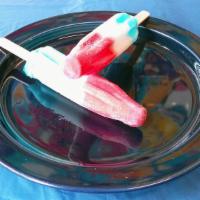 Red, White, Blue Bomb Pop 12 Ct. · Cherry, raspberry, and lime flavored ice cream.