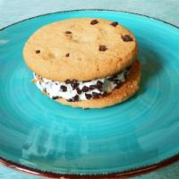 Chocolate Chip Cookie Sandwich 24 Ct. · Two fresh chocolate cookies with vanilla ice cream inside coated with fresh chocolate chips.
