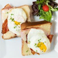 Open Face Breakfast Sandwich · Brioche bread, ham, swiss, fried eggs, bacon and aioli.