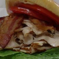 Turkey Sandwich · Smoked Turkey, bacon, fig jam, mayo, lettuce, tomato.