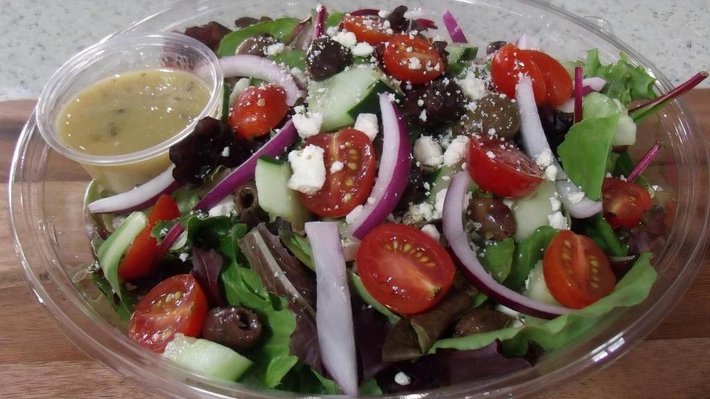 Lg Greek Salad · Mixed greens, olives, feta, tomatoes, red onions, cucumbers, house made Greek vinaigrette.
