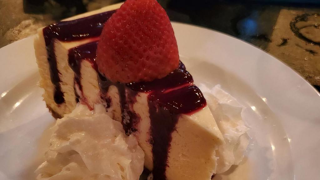 101 New York Style Cheesecake · raspberry coulis