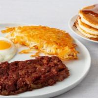Corned Beef Hash & Eggs* · Served with two eggs, any style, hash browns and your choice of toast, English muffin or thr...