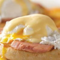 Eggs Benedict · 2 poached eggs and smoked ham over a toasted english muffin, topped with hollandaise sauce. ...
