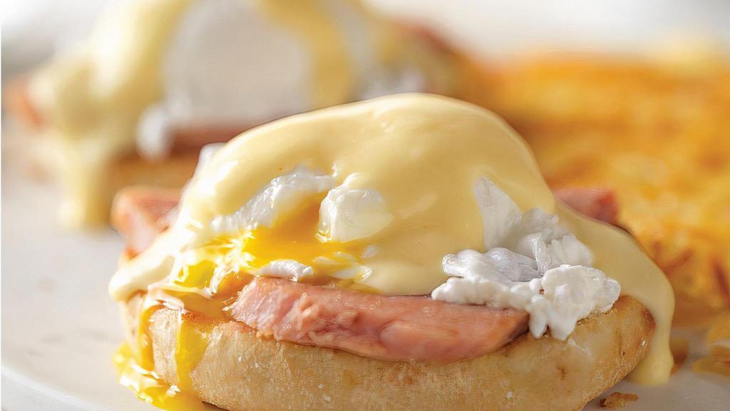 Eggs Benedict* · Two poached eggs and smoked ham over a toasted English muffin, topped with Hollandaise sauce. Bread choice not included..