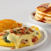 Fresh Spinach & Bacon Omelette* · Fresh spinach, bacon and diced onions, topped with Swiss cheese and Hollandaise sauce.