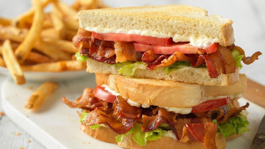 Bacon Lover'S Blt · Bacon, lettuce, tomato and mayo on toasted bread..