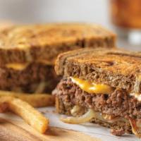 Patty Melt* · Sautéed onions, American and Swiss cheeses on grilled marbled rye bread.