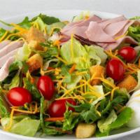 Celebrity Chef Salad · Hand-carved turkey breast, ham, Cheddar cheese, tomato, hard-boiled egg and seasoned crouton...