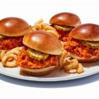 Buffalo Chicken Sliders · Buffalo chicken tossed with your choice of wing sauce, topped with pickles and served with y...