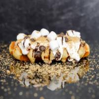 S'More · Toasted Belgian waffle with marshmallow fluff, Hershey's chocolate chips, graham cracker cru...