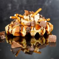 Peanut Butter Pretzel Dream · Toasted Belgian waffle with peanut butter icing, Reese's peanut butter cups, pretzel sticks,...