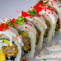 New-Snow White Roll · Shrimp tempura,cream cheese,avocado and mangop. Topped with white fish,tobiko,cilantro, taki...