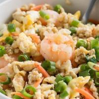 Shrimp Fried Rice · Shrimp fried rice stir fried in wok with scrambled egg, onions, carrots and green peas.