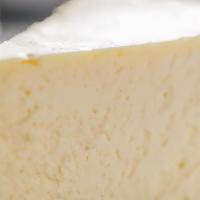 Cheesecake · Cream cheese, sour cream, lemon zest and graham cracker pie crust.
