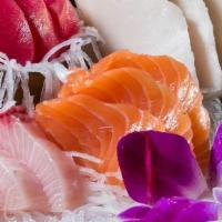 Sashimi Lunch · 11 pieces of chef's choice sashimi  & rice . Served with house salad.