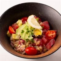 Tuna Poke Bowl · Tuna cubes, cucumber, tomato, onion, scallion, avocado and quail egg with yuzu sauce. Served...