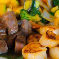 Hibachi Chicken & N.Y Steak · hibachi chicken and steak, served with fried rice and house salad