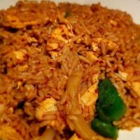 Thai Basil Fried Rice · Spicy fried rice with basil, bell pepper, onions and chili paste.