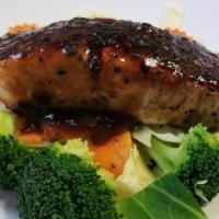 Salmon Teriyaki · Grilled eight oz salmon filet served with steamed veggie and topped with teriyaki sauce.