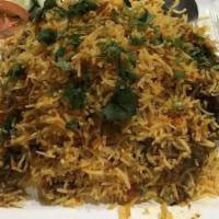 Goat Biryani · Goat and saffron spice rice.