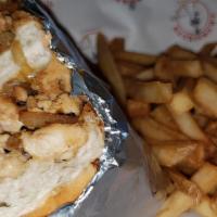 Chicken Philly · Grilled chicken and onion with provolone cheese on a toasted hoagie roll
