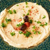 Hummus Dip · Freshly made using our family recipe.