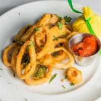 Calamari Fritti · Fried calamari and zucchini, spicy tomato sauce.