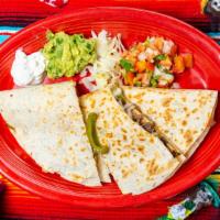 Big Quesadilla · A large flour tortilla filled with mozzarella cheese chicken breast served with jalapeño, pi...