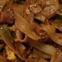 Drunken Noodles   · Spicy. Flat rice noodles, eggs, chili, green beans, bell peppers, baby corn n & Thai basil.